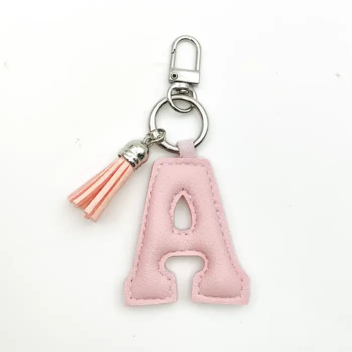 Porte-clés en cuir avec initiale A-Z, mini pompon décoratif, couleur unie, alphabet, ornement de sac