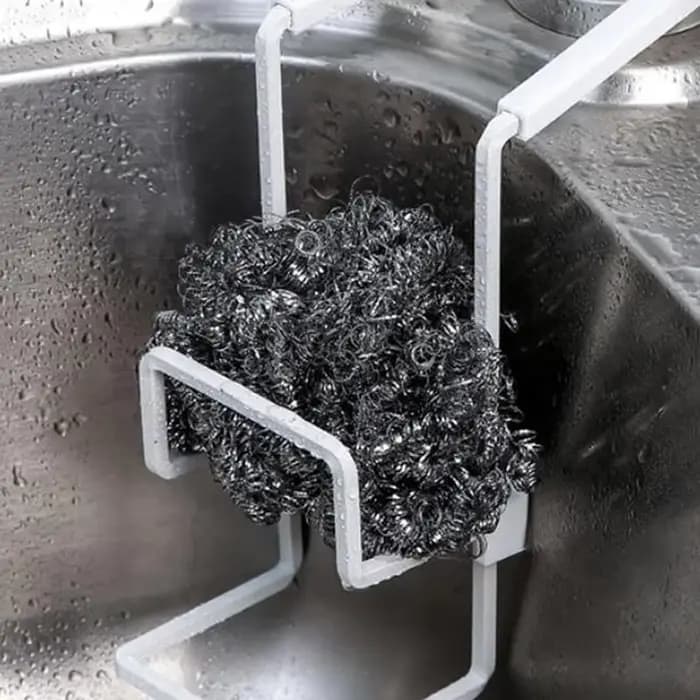 Le support à éponge pour évier est utilisé pour accrocher des supports de robinet de cuisine