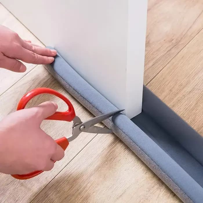 Bande d'étanchéité pour bas de porte