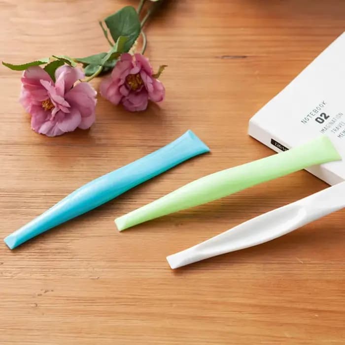Grattoir de nettoyage double extrémité pour cuisinière à gaz