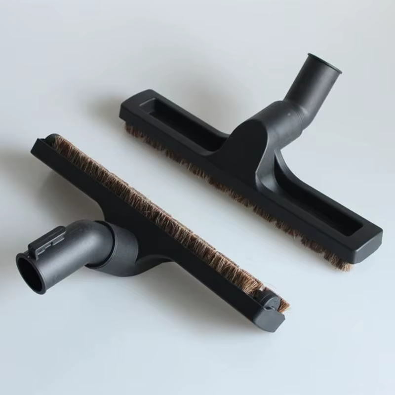 Tête de brosse à dépoussiérer