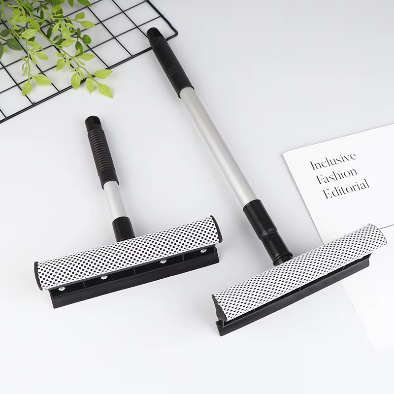 Raclette de nettoyage de vitres de voiture