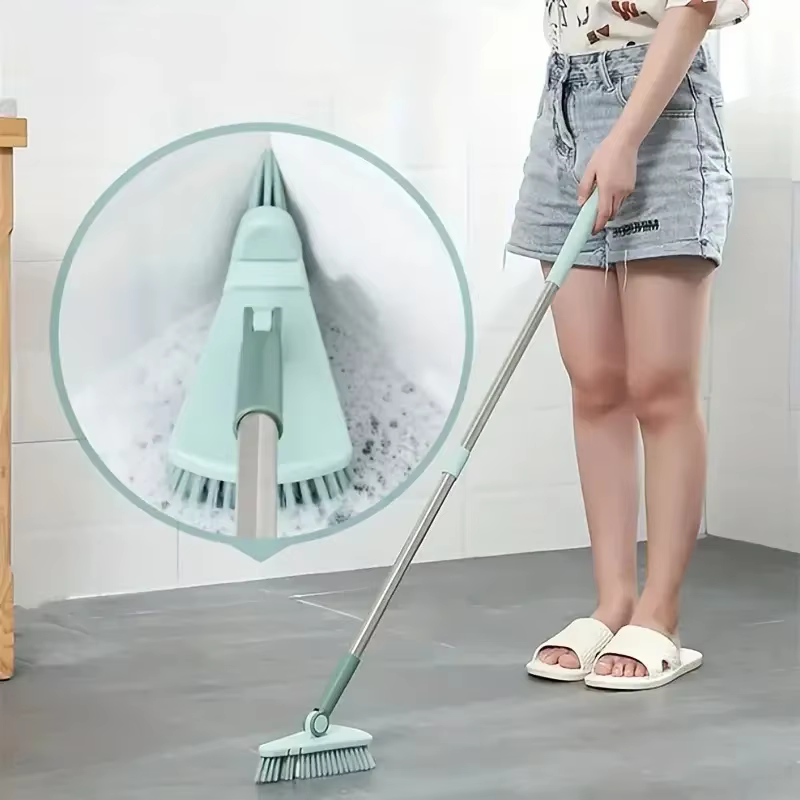 Une brosse de sol triangulaire à poils durs à long manche, brosse de nettoyage des espaces des carreaux de salle de bain