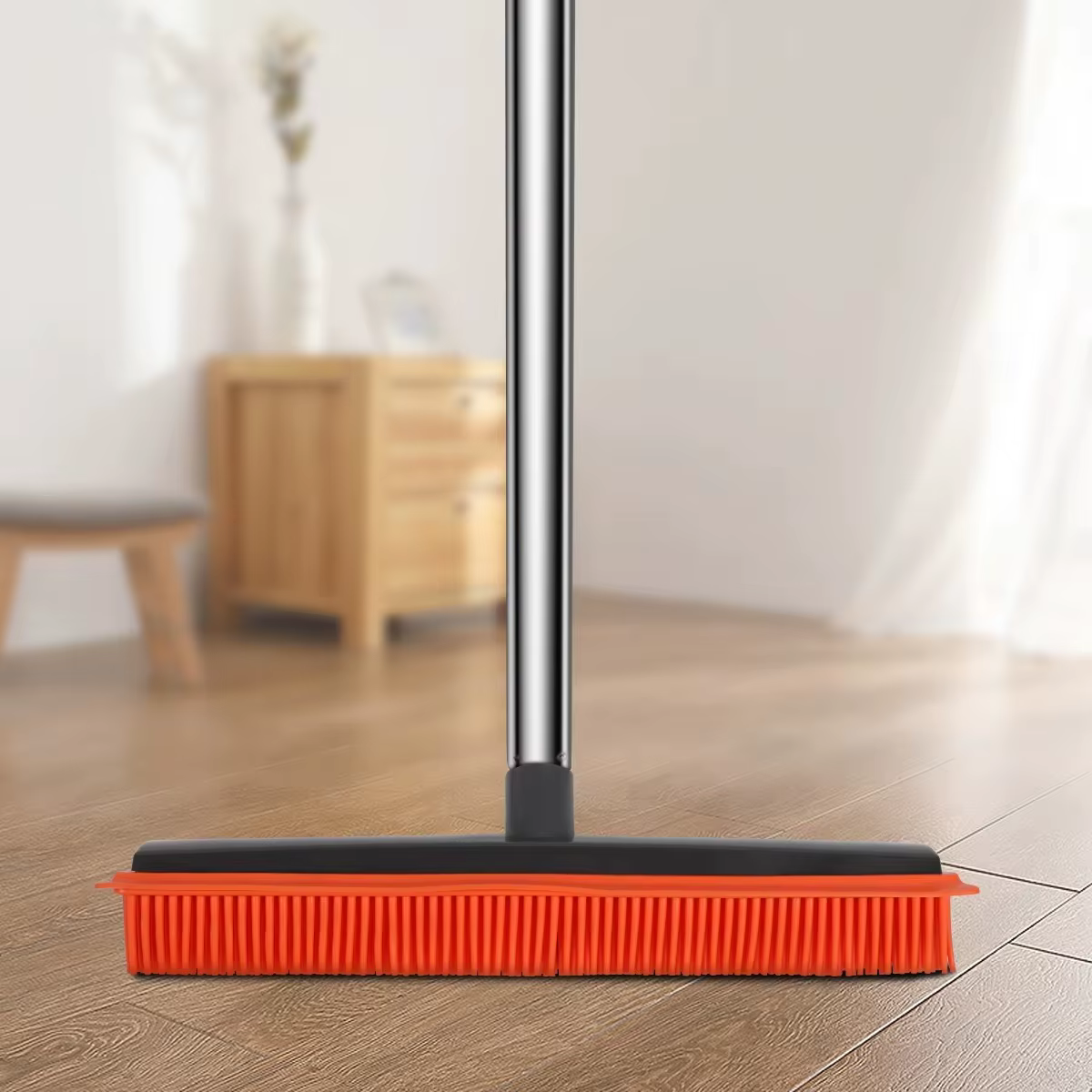 Balai en caoutchouc pour tapis