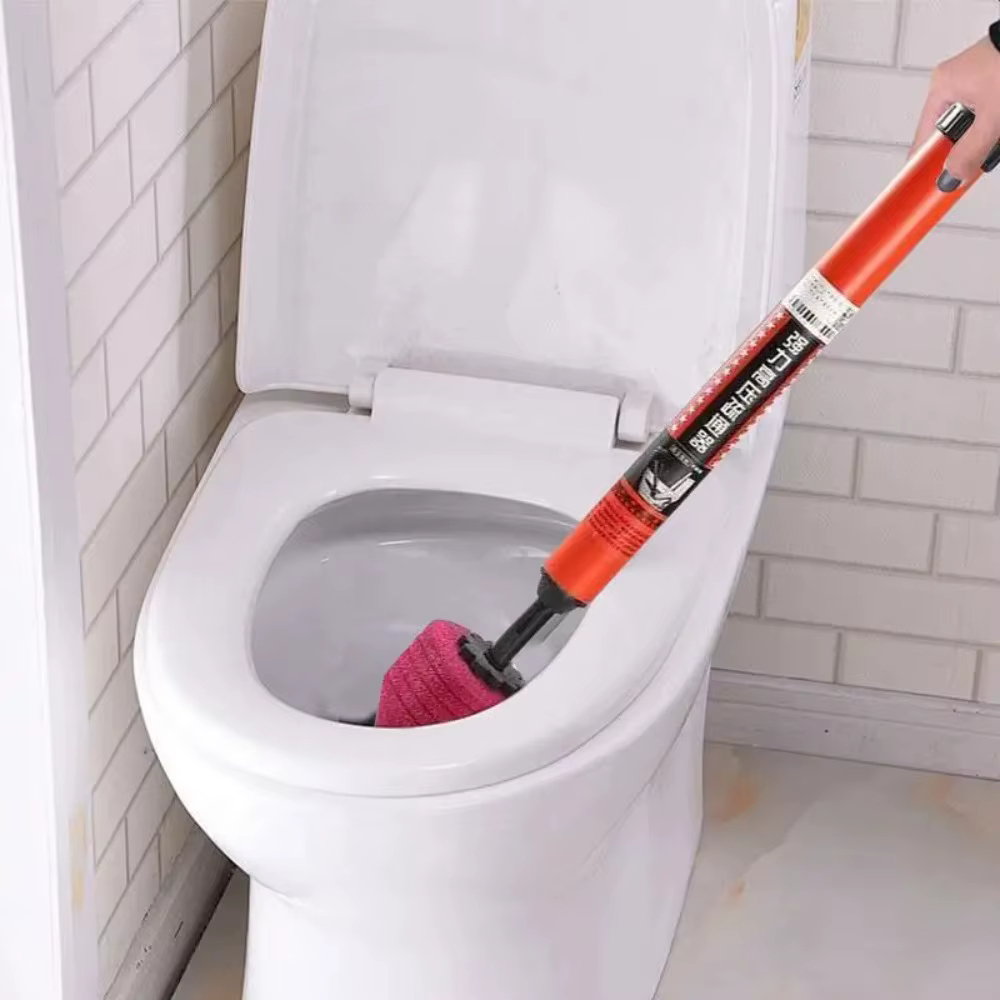 Outil de déclenchement haute pression pour toilettes à piston d'air avec poignée ergonomique