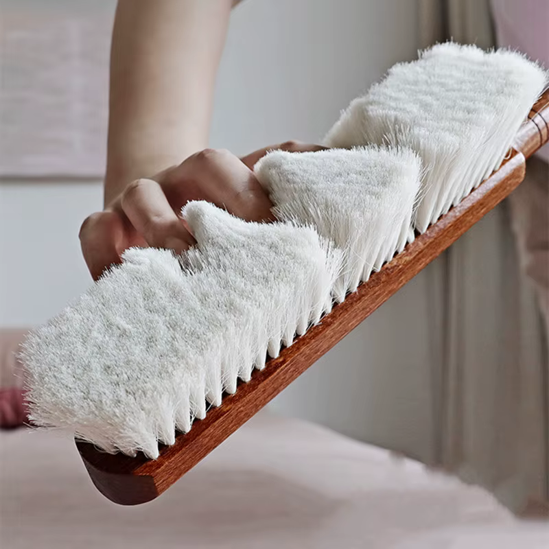 Brosse de balayage de lit